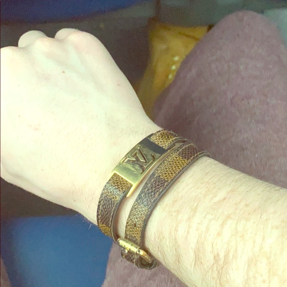 Louis Vuitton men’s or women’s wrist wear.